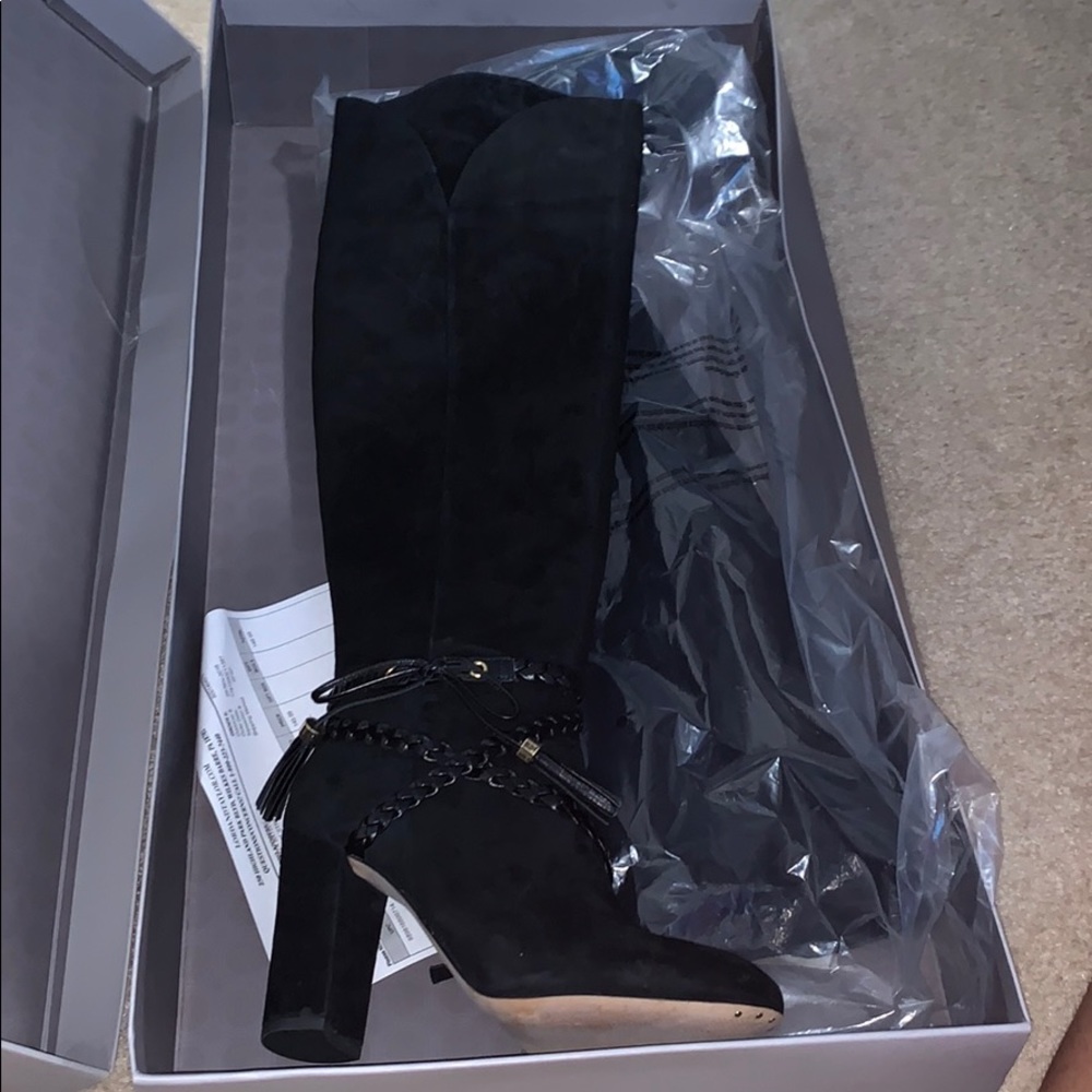 Tall heeled boots
